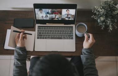 View of computer screen showing online meeting